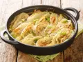Finoçchi in padella con pangrattato, dorati e profumati, pronti per essere gustati.